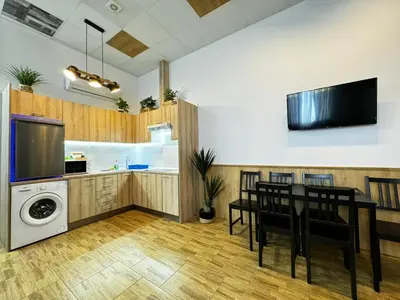 a kitchen and dining room with a table and chairs at Salom 5 in Valencia
