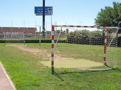 a net in a field next to a soccer field at Patacona Breeze in Valencia