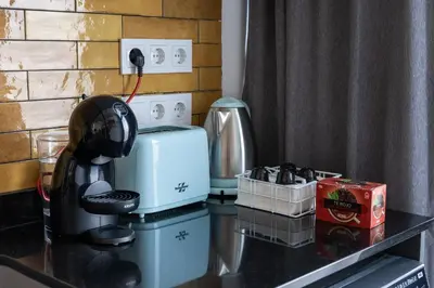 a counter top with a coffee maker on it at Vip Apartments Valencia in Valencia