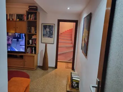 a living room with a flat screen tv on a stand at Private Room Valencia Center in Valencia