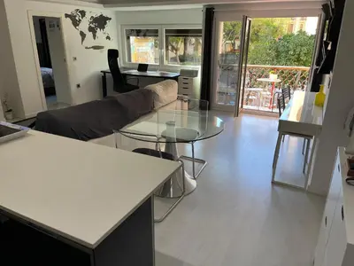 a living room with a couch and a table at Plaza del Carmen Boutique in Valencia