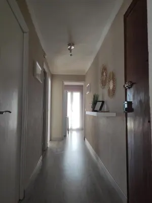 a hallway of an empty room with a door and a hallwayngthngthngthngth at Apartamento rural Casa Calo in Losa del Obispo