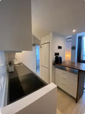 a kitchen with white cabinets and a dishwasher at VALENCIA RENT APARTS MILAGROSA 1 in Valencia