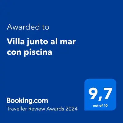a screenshot of a phone with the text awarded to villa juno all mar at Agradable Villa junto al mar con piscina in Sagunto