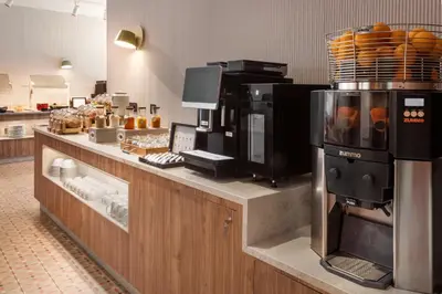 a kitchen with aasteryasteryasteryasteryasteryasteryasteryasteryasteryasteryasteryastery at Catalonia Excelsior in Valencia