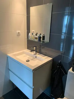 a bathroom with a sink and a mirror at Manises POLIGONO in Manises