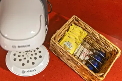a blender next to a basket with batteries in it at Loft Nou Benicalap - Housevanlive in Valencia