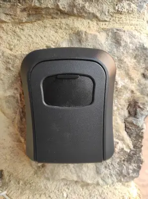 a black object sitting on a stone wall at Casa Puri in Jérica