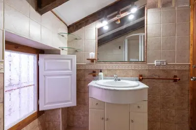 a bathroom with a sink and a mirror at Malvarrosa Las Arenas II in Valencia