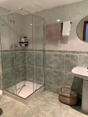 a bathroom with a shower and a sink at Alex- DUPLEX APARTMENT- City in Valencia