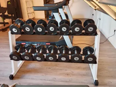 a rack filled with lots of dumbbells at Hotel Conqueridor in Valencia