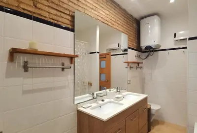 a bathroom with a sink and a mirror at Enjoy Apartment 4 pax at Ruzafa with sunny terrace in Valencia