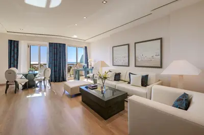 a living room with a couch and a table at Las Arenas Balneario Resort in Valencia