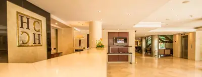 a lobby of a building with a lobby at Hotel Valencia Center in Valencia