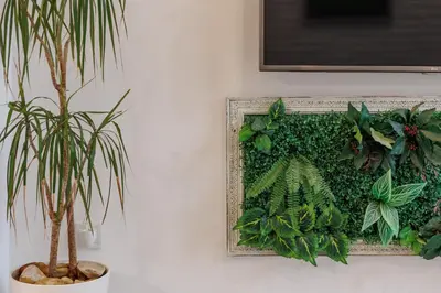 a picture on a wall with a bunch of plants at Artistic Loft, Full Of Light - City Center Ruzafa in Valencia