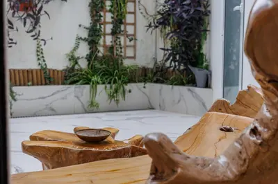 a wooden table with a bowl on top of it at Artistic Loft, Full Of Light - City Center Ruzafa in Valencia