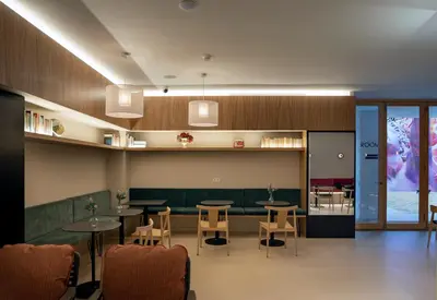 a restaurant with tables and chairs in a room at Mythic Valencia in Valencia