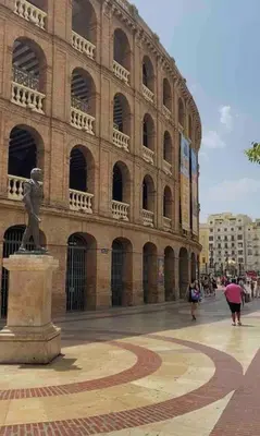 a large building with a statue in front of it at Vlc Center 4 Room Apartment in Valencia