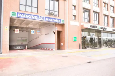 a building with a parking on it at Hotel Albufera in Alfafar