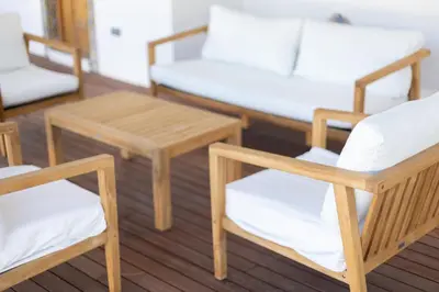 a group of chairs and tables in a room at Villa Huerta 1 Manises, jacuzzi, sauna, piscina in Manises