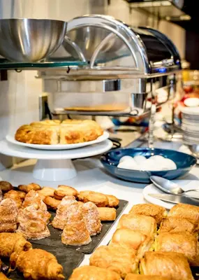 a bunch of food on a counter with plates of food at Zenit Valencia in Valencia