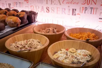 a group of bowls filled with different types of food at Hotel Mediterraneo Valencia in Valencia
