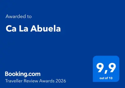 a blue screen with the text awarded to ca la abuela at Ca La Abuela in Requena