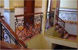 a balcony with a wrought iron railing in a building at Hotel Rioja in Benisanó