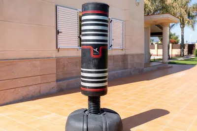 a baseball bat on display in front of a building at Casa junto al mar con jardín in Sagunto