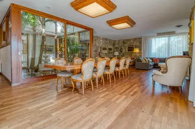 a dining room with a table and chairs at Villa Montgrau in Llano de Gorra