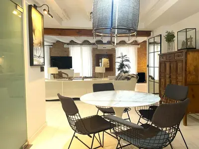 a dining room with a table and chairs at Valencia Luxury - Boutique El Carmen in Valencia