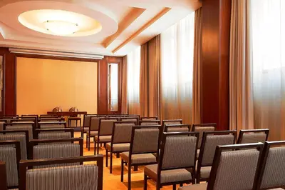 a row of chairs in a conference room at The Westin Valencia in Valencia