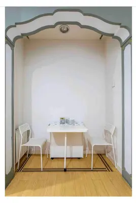 a white table and two chairs in a room at Habitación Apartamento Suite Papillon in Valencia