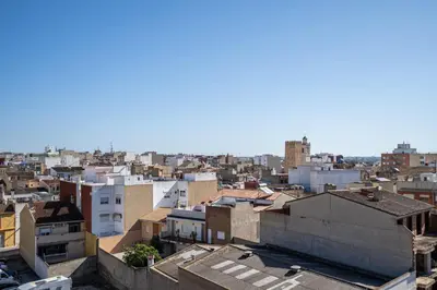 a view of a city with buildings at Hotel Bartos in Almussafes