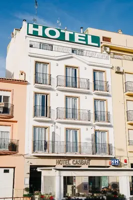 a hotel building with a sign on top of it at Hotel Casbah in El Puig