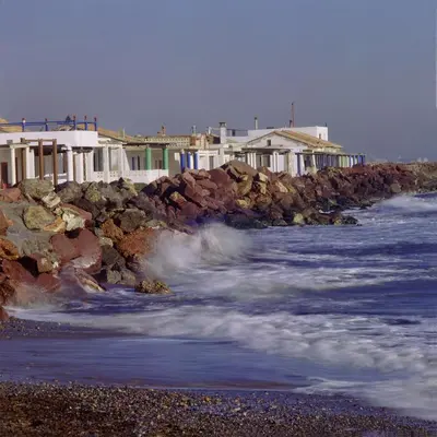 a group of houses on the shore of a beach at Hotel Casbah in El Puig