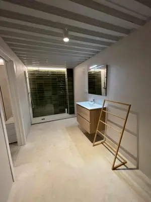 a bathroom with a sink and a mirror in a room at Maravilloso Loft junto a Ciudad de Artes y Ciencia in Valencia