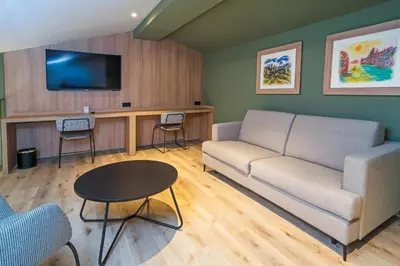 a living room with a couch and a table at DWO Valencia in Valencia
