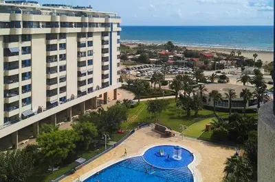 an aerial view of a hotel and the beach at ApartUP Patacona Oriental in Valencia