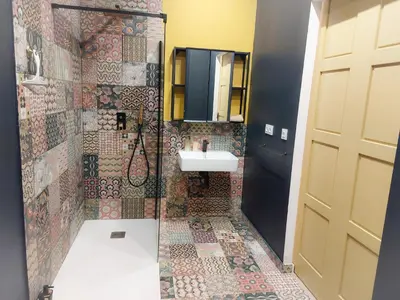a small bathroom with a sink and a mirror at Ruzafa in love in Valencia