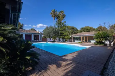a swimming pool in the backyard of a house at Villa Huerta 2, Paterna, jacuzzi, sauna in Paterna