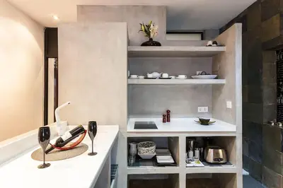 a kitchen with a counter with a phone on it at Pequeño Loft en Ruzafa wifi in Valencia
