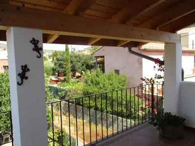 a view from the balcony of a house with a fence at Casa La Higuera in Chulilla
