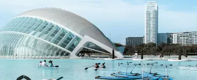 a building with people in the water in front of it at MHrosa in Valencia