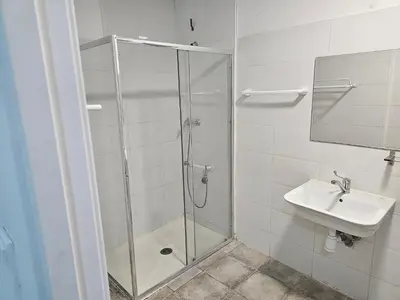 a bathroom with a shower and a sink at MHrosa in Valencia
