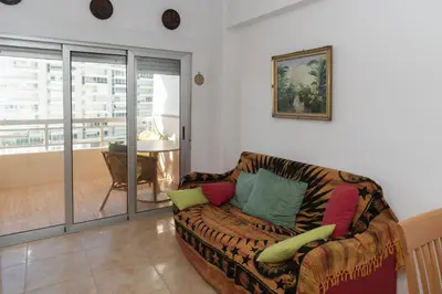a living room with a couch with pillows on it at Prado, A-5-52 PK INT 85 in Cullera