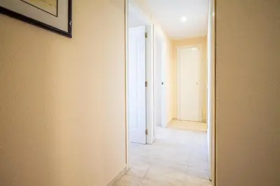 an empty hallway with a hallway leading into a room at ESPACIO 5 - Primera Línea de Playa in Cullera