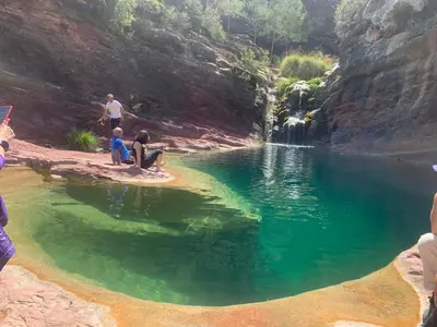 a group of people sitting in a pool of water at Casa Rural El Rincón de Beatriz in Ayódar