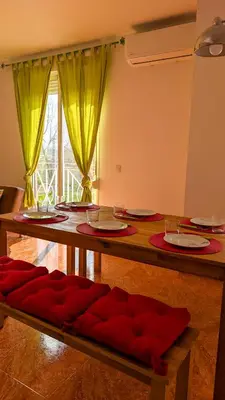 a living room with a couch and a large window at LA CASA AZUL de Anna in Anna