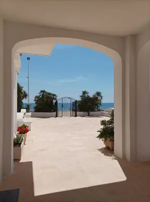 an open hallway with a view of the beach at Almar Collection Cullera AR in Cullera